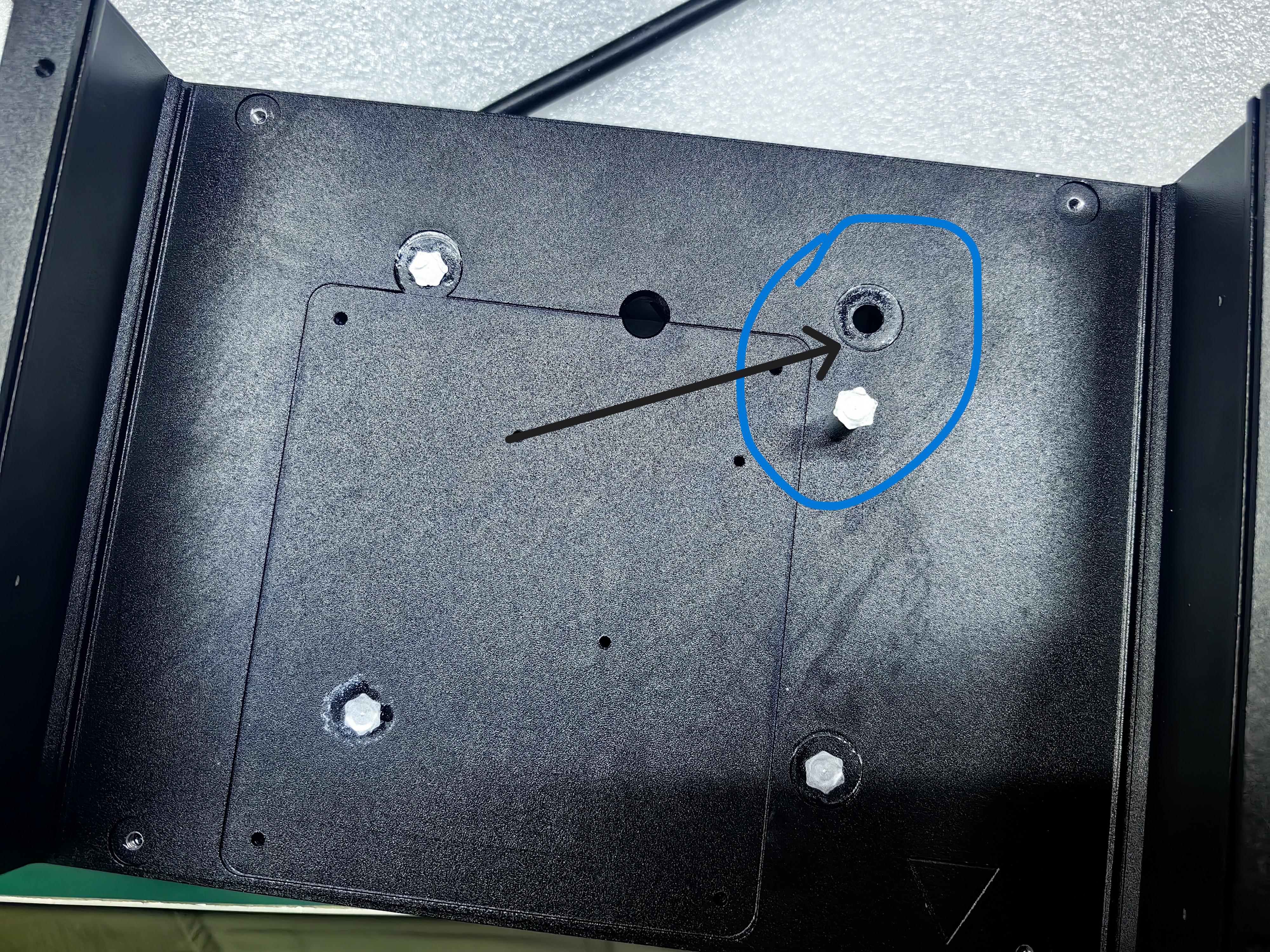 Detached press-fit standoff found during industrial computer enclosure assembly verification